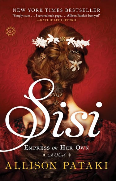 Book cover for Sisi: Empress on Her Own by Allison Pataki featuring a woman with an elaborate braided hairstyle and flowers.