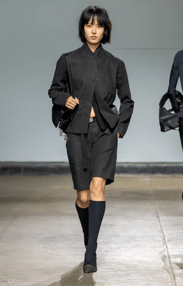 Johanna Parv black shirt and shorts ensemble at London Fashion Week 2026.