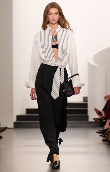 Ralph Lauren Spring/Summer 2026 monochrome striped blouse with black trousers on the runway.