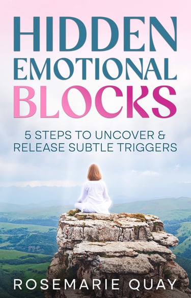Book cover for Hidden Emotional Blocks by Rosemarie Quay featuring a woman meditating on a mountain cliff.