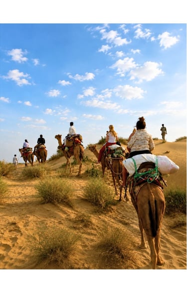 Camel safari through private sand dunes near Jaisalmer.