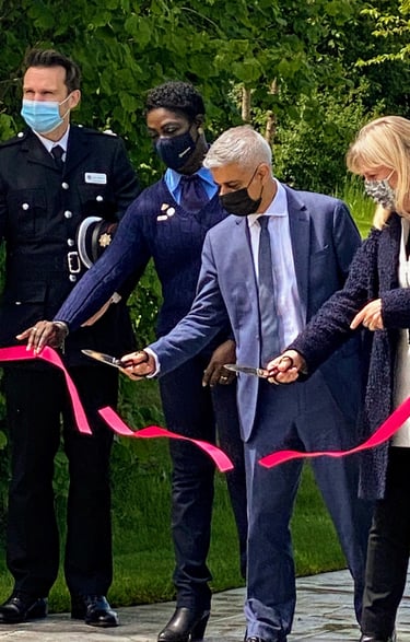 The mayor of London cutting ribbon at the opening of Blossom Garden at Queen Elizabeth Olympic Park