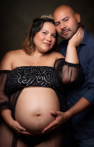 a pregnant woman and her husband are posing for a photo