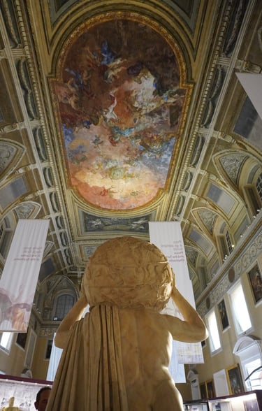 statue of hercules holding the world