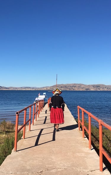 woman walking to a boat