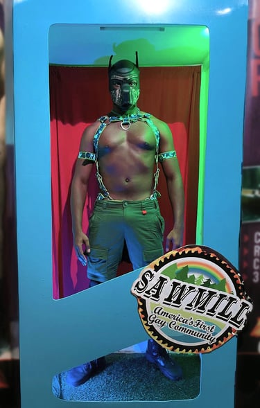 Man in pup mask posing in a giant toy box.