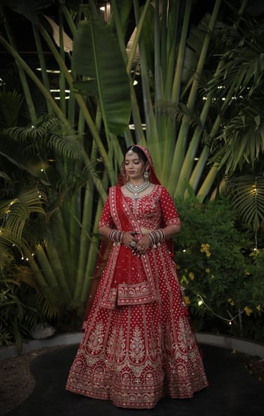 Vadodara Gujarati bridal makeup in red lehenga with jewellery, wedding photoshoot portrait