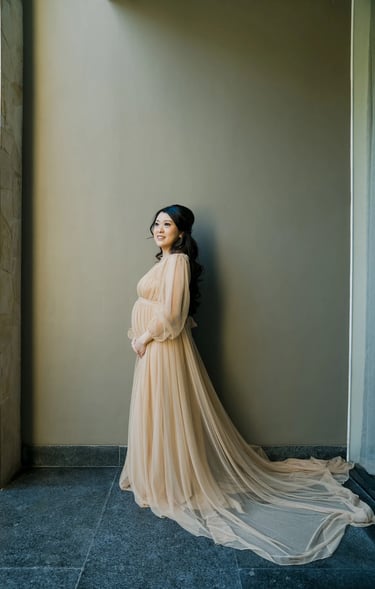 Luxury maternity portrait inside The Apurva Kempinski Bali suite