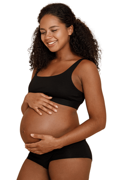 Mulher Gravida com a Mão na Barriga