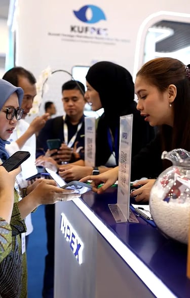 INPEX booth visitors registering via QR code and exploring the interactive zones