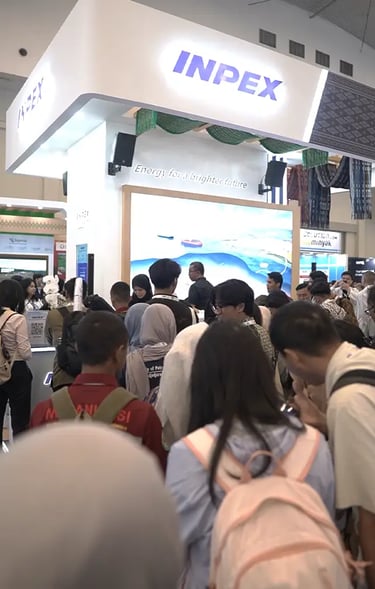 INPEX booth visitors exploring the interactive zones