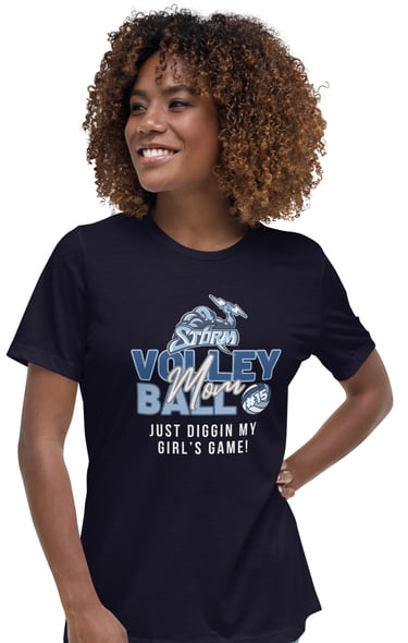 a woman wearing a t - shirt that says, "Volleyball Mom",