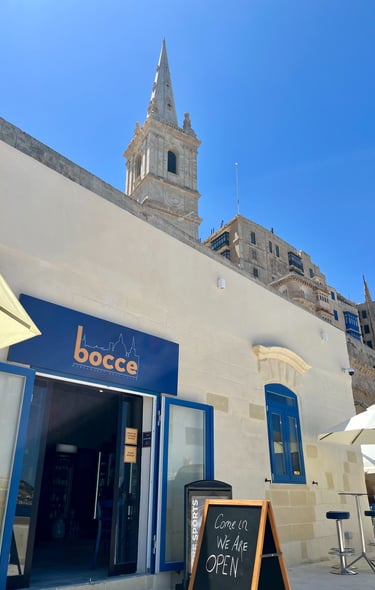 outside bocce bistro with valletta in the background