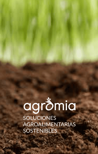 Logo de Agromia sobre tierra y brotes verdes con el lema ‘Soluciones agroalimentarias sostenibles
