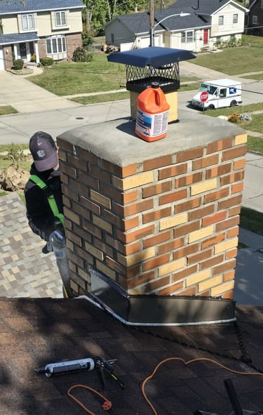 "Structural repair of a brick chimney by Profaster Services in Des Moines."