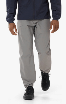 a man wearing Arc'teryx waterproof pants