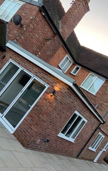 Raised patio and turf installed during garden transformation in Pershore