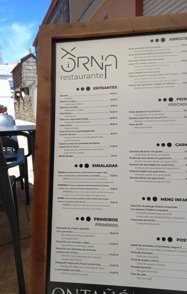 a menu board with a menu for a restaurant