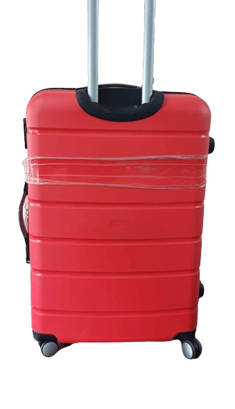 a red fiber suitcase trolley with black handle 