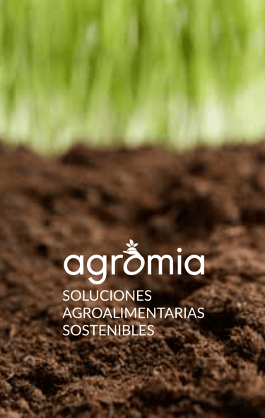 Logo de Agromia sobre tierra y brotes verdes con el lema ‘Soluciones agroalimentarias sostenibles
