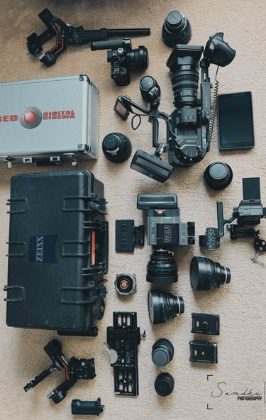 a bunch of cameras and cameras on a carpet