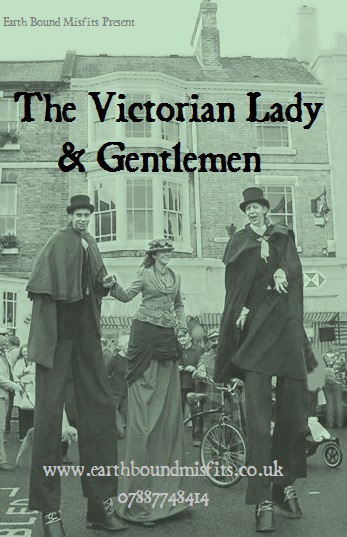 Victorian stilt walkers performing as a lady and gentlemen in period costumes at a street event.
