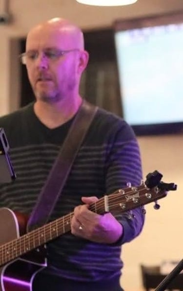 William Finn from Finn's Echo performing in front of live audience