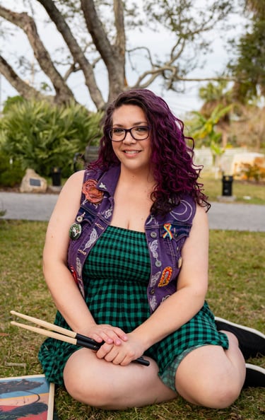 Self portrait, purple hair, smiling, green dress, purple vest