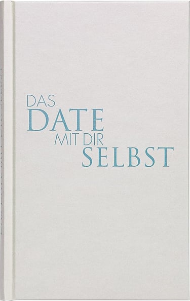 a book with a white cover and blue text