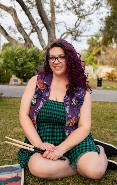 Self portrait, purple hair, smiling, green dress, purple vest