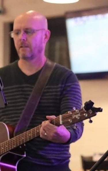 William Finn from Finn's Echo performing in front of live audience