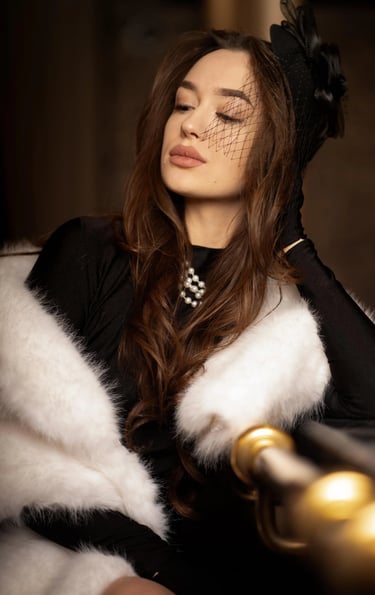 Old Hollywood style portrait photo of a women in white fury coat, gloves and pearl, with full lips