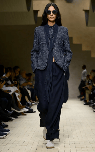 Armani Spring Summer 2026 – Tailored navy blazer with relaxed pants.