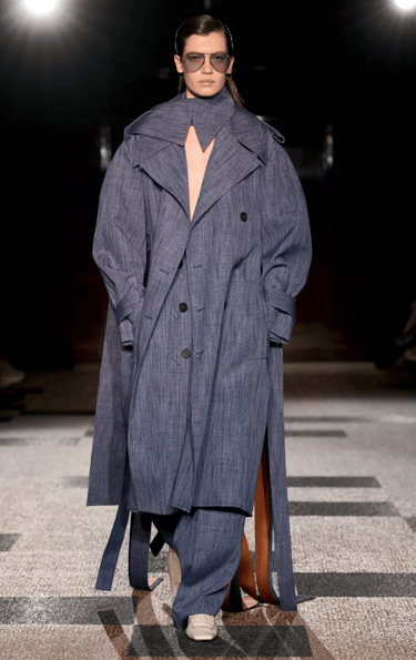 Roksanda model in oversized denim trench coat and trousers on the runway at London Fashion Week 2026