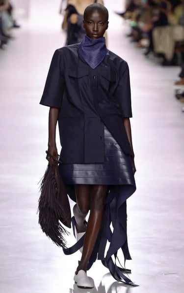 Bottega Veneta Spring Summer 2026 – Navy asymmetric fringe leather skirt look.