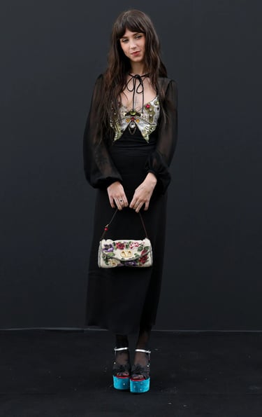 Clairo at Paris Fashion Week 2026 in jewelled look.