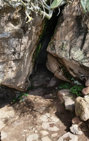 Benikulà cave in Pantelleria with natural steam rising from volcanic rocks
