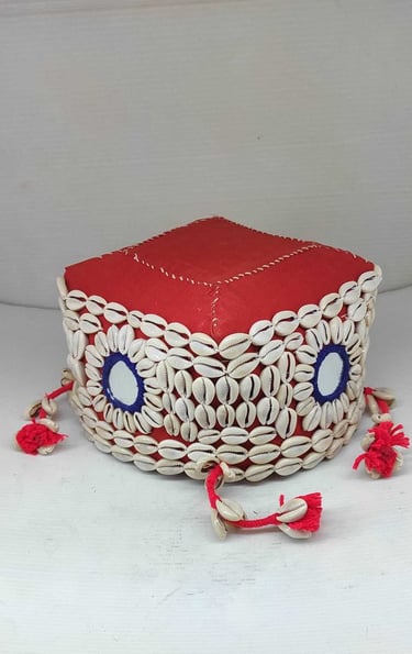 "Bamboo basket with red textile wrap, ornamental shell design, and artificial flower–Export-grade"