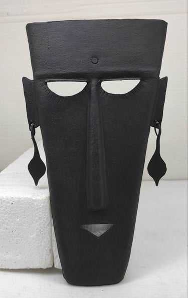 "Iron tribal mask with moon-inspired design–handmade wall accent-Globally demanded"