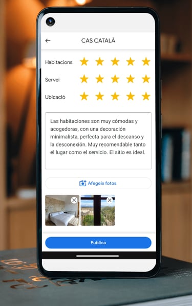 a smartphone phone showing a review of a hotel room