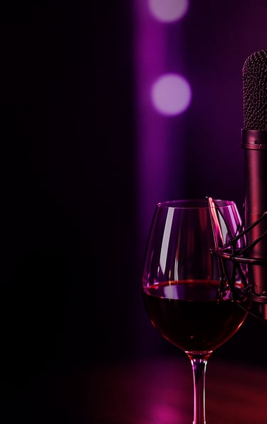 Podcast microphone with a glass of wine.
