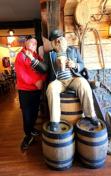 The Pirate makes a friend at Taberna Del Viejo Lobo in Ushuaia, Argentina