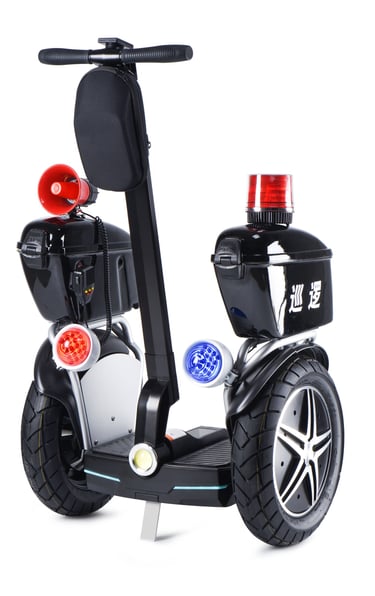 a black and white scooter with a police officer on it