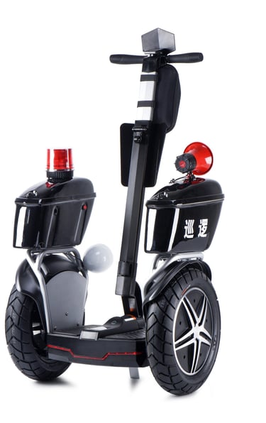 a black and white scooter with a red light on it