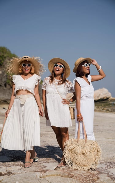 Friends walking together during beach photoshoot at Melasti Beach Bali