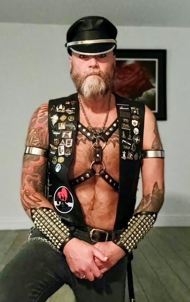 Man in full leather gear.