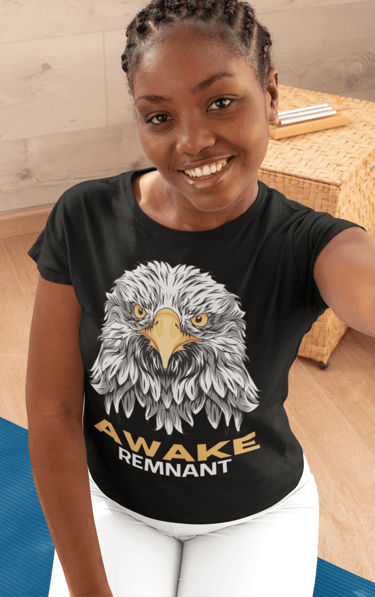 Smiling woman in black t-shirt with fierce eagle face and "Awake Remnant" text. God's last day Army!