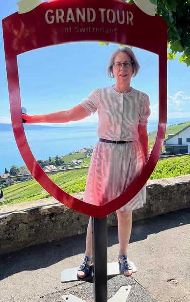 Professeure de français en Suisse avec le lac Léman en arrière-plan