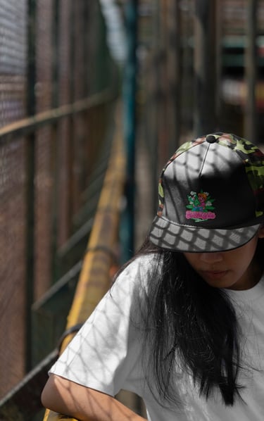 a woman in a white shirt and a black hat