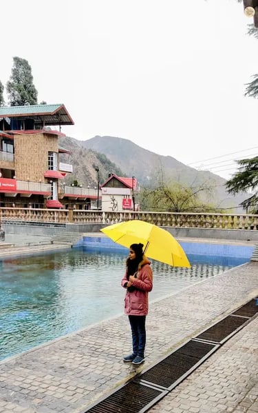 Sacred water kund at Bhagsunag Temple in McLeod Ganj, Dharamshala, visited by pilgrims for prayer and spiritual cleansing.